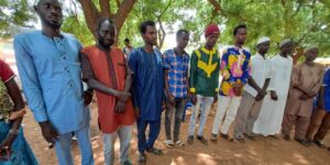 Community members form a restorative circle during a sharing and listening exercise. Credit: OTI/LRI